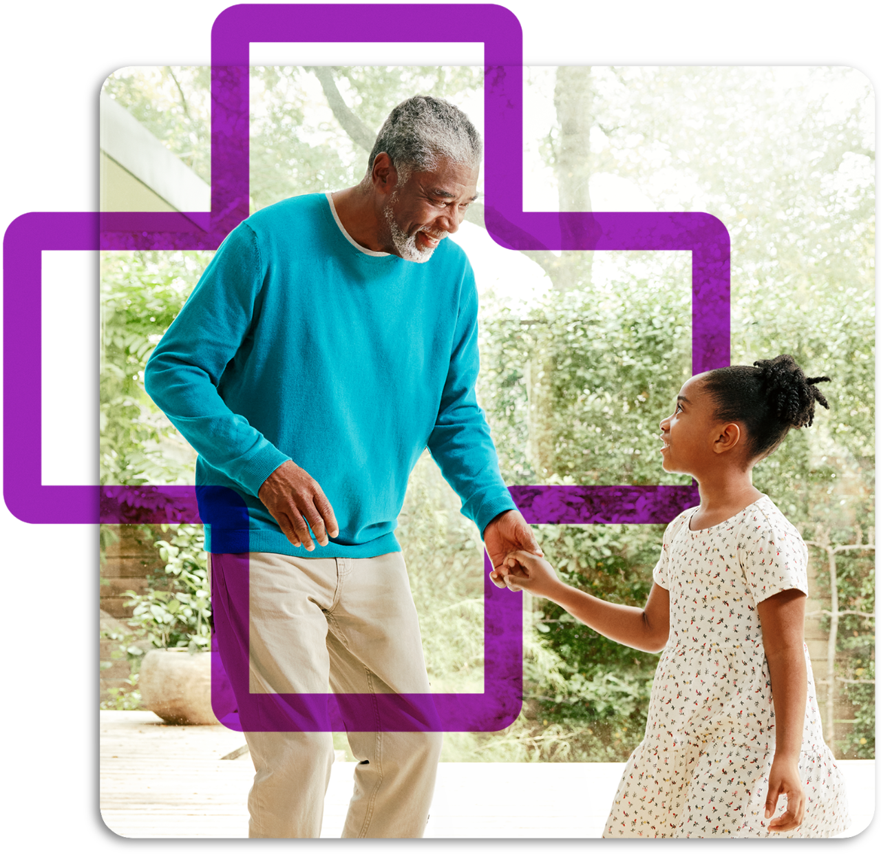 Grandfather and granddaughter holding hands